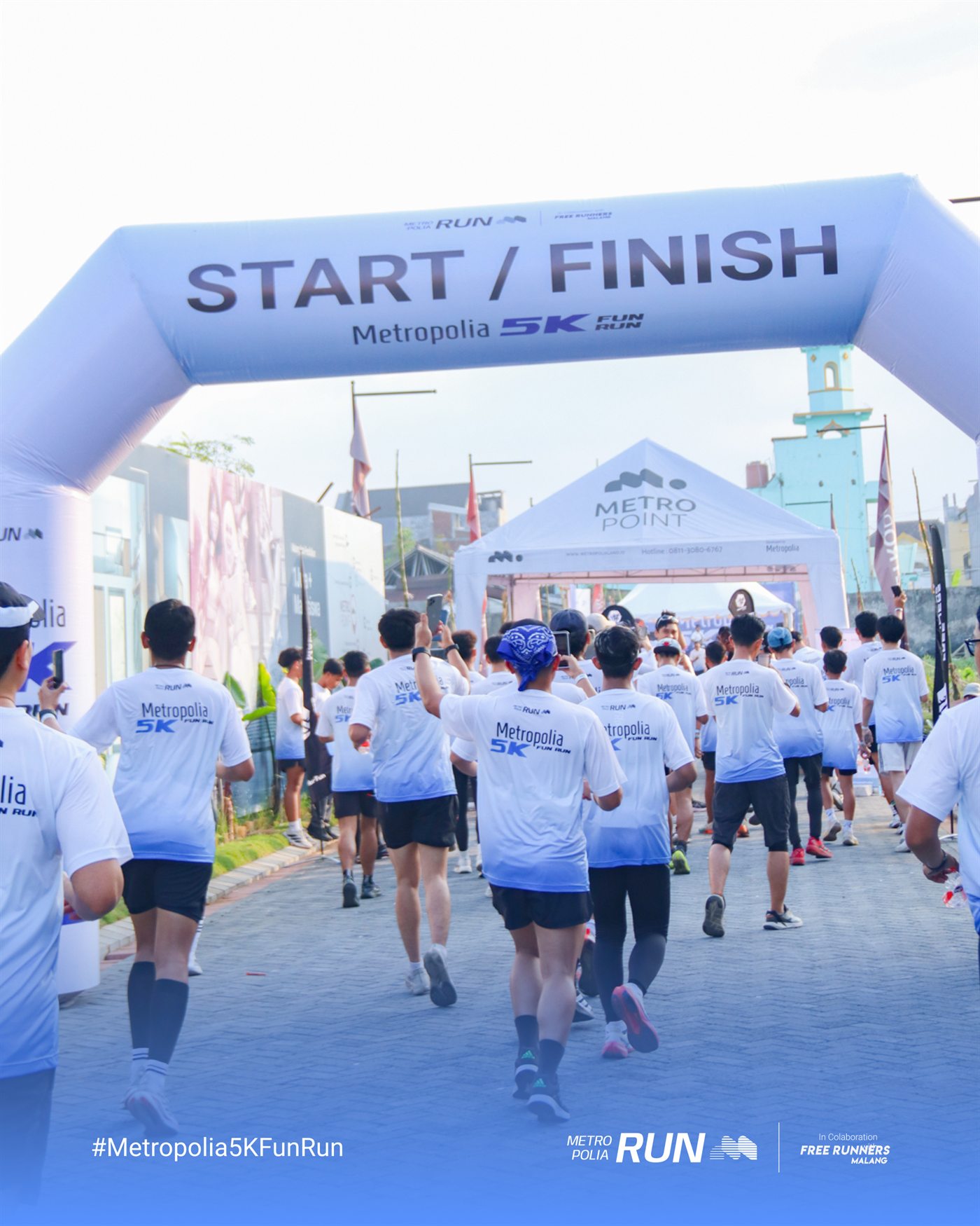 Suasana peserta Metropolia Fun Run 5K di garis start dan finish